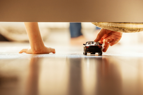 boy with toy car