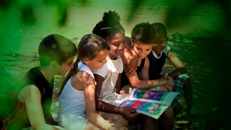 Kids reading in a group